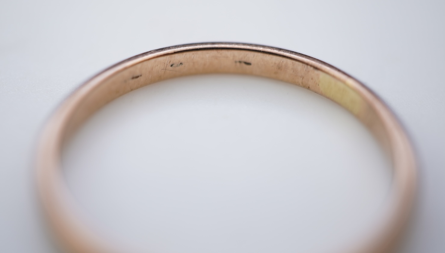 Two gold wedding bands
